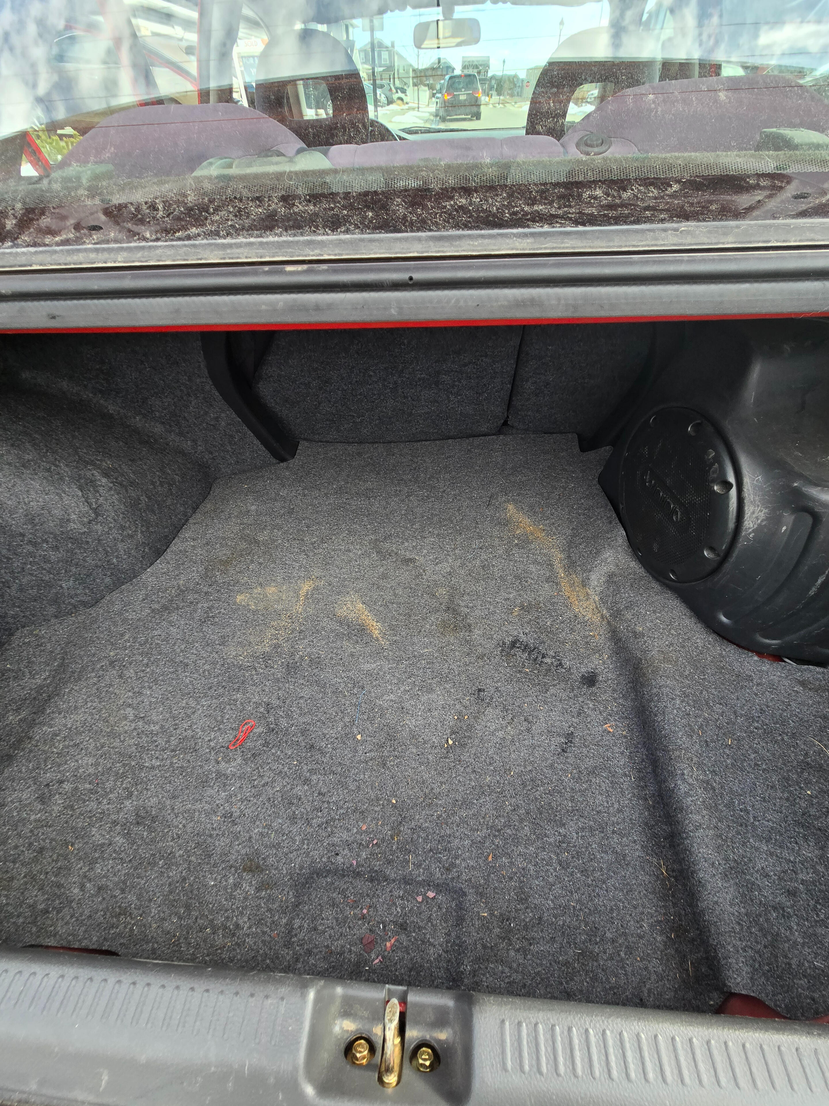 Dirty and dusty trunk before high end car detailing, Calgary.