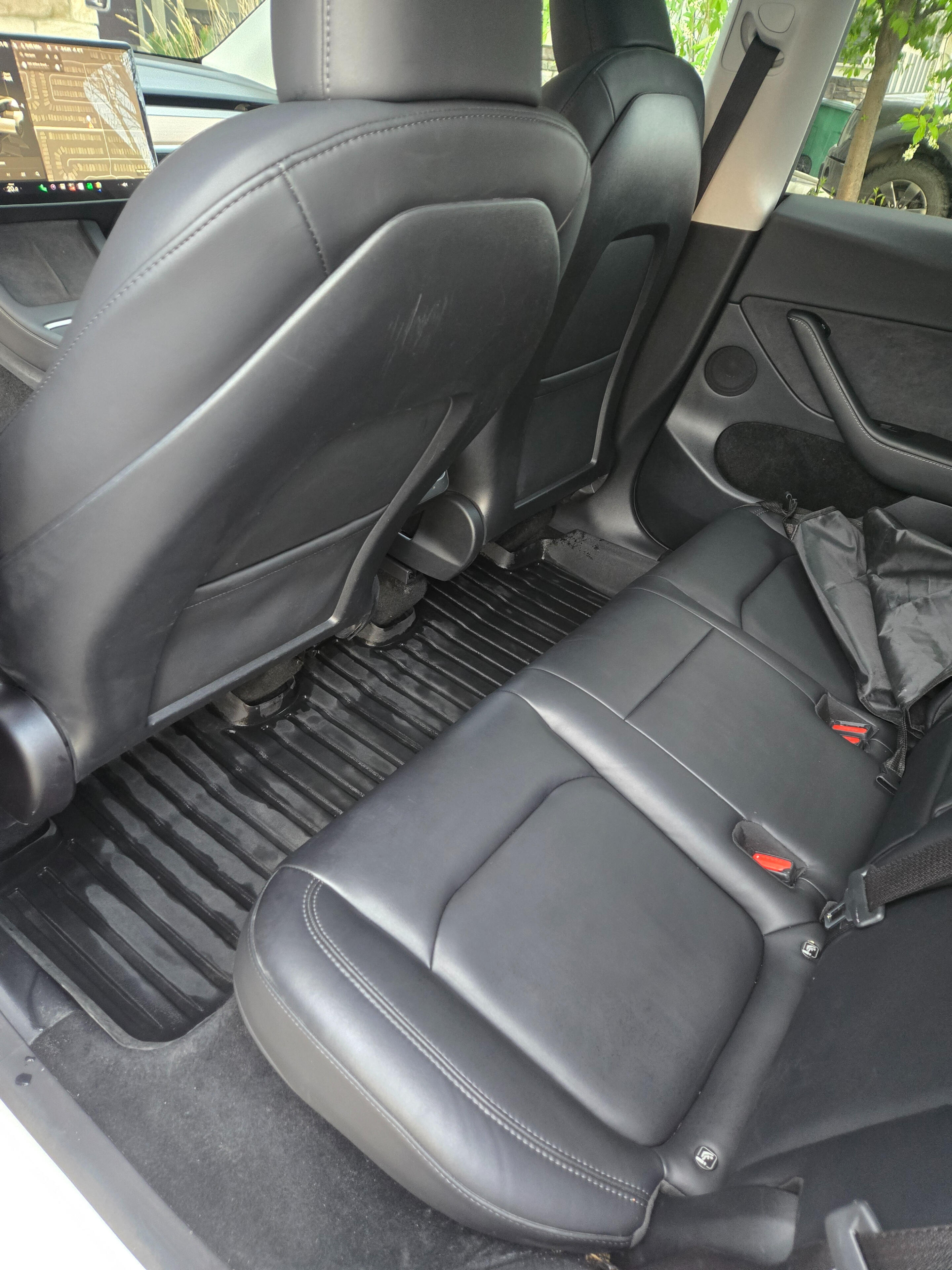 clean tesla model 3 backseat after deep cleaning car detailing service. Calgary Alberta.